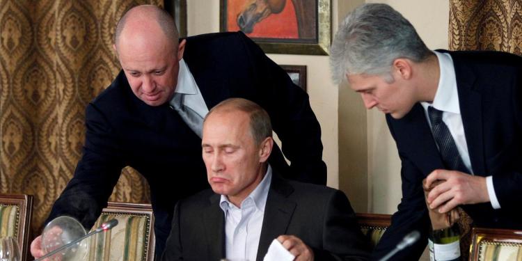 Евгений Пригожин (слева) и Владимир Путин / REUTERS