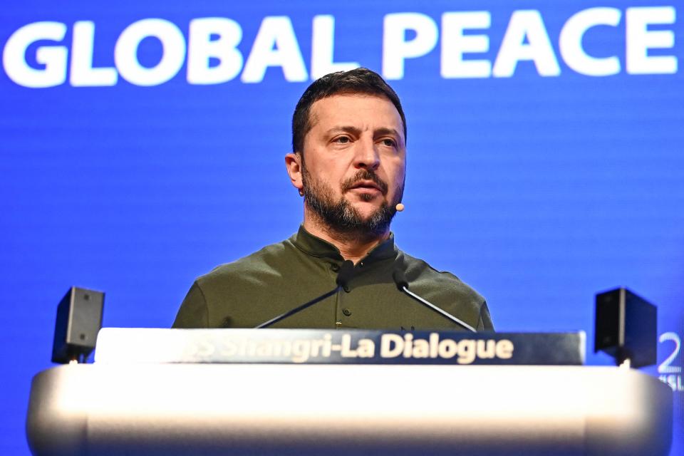 Ukraine’s president Volodymyr Zelensky speaks during the 21st Shangri-La Dialogue summit at the Shangri-La Hotel in Singapore on 2 June 2024 (AFP via Getty Images)